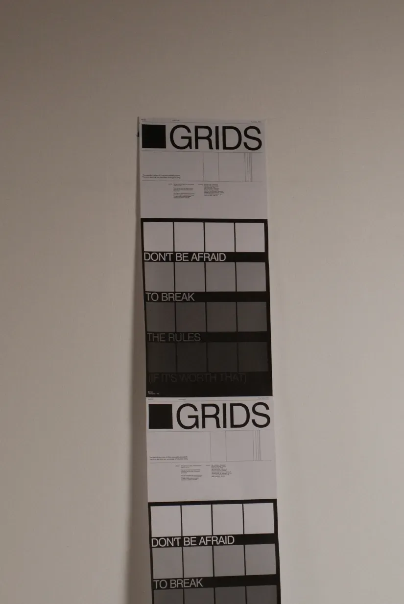 Two identical white cards display 'GRIDS' text and sequential grayscale test patterns.